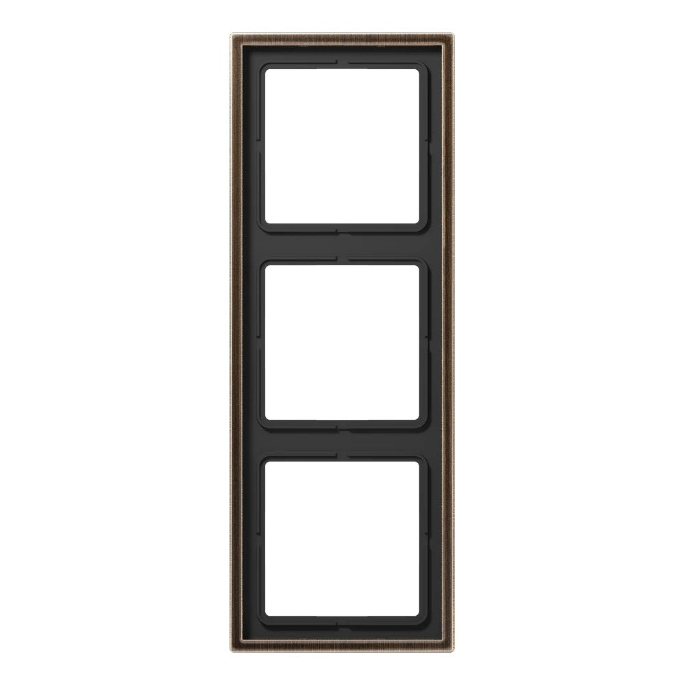 JUNG LS 990 metal frame, 3-gang, antique brass